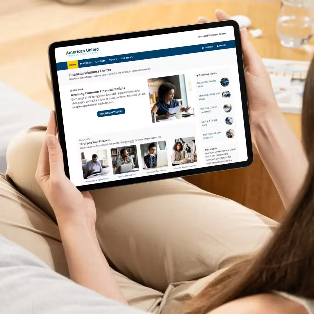 Reading the Financial Wellness Center on a tablet